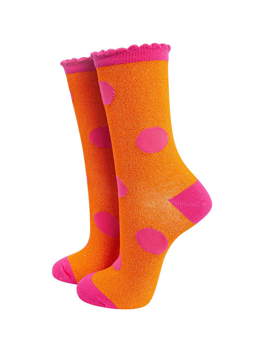 orange and pink polka dot glitter socks with pink scalloped top and an all over glitter sparkle