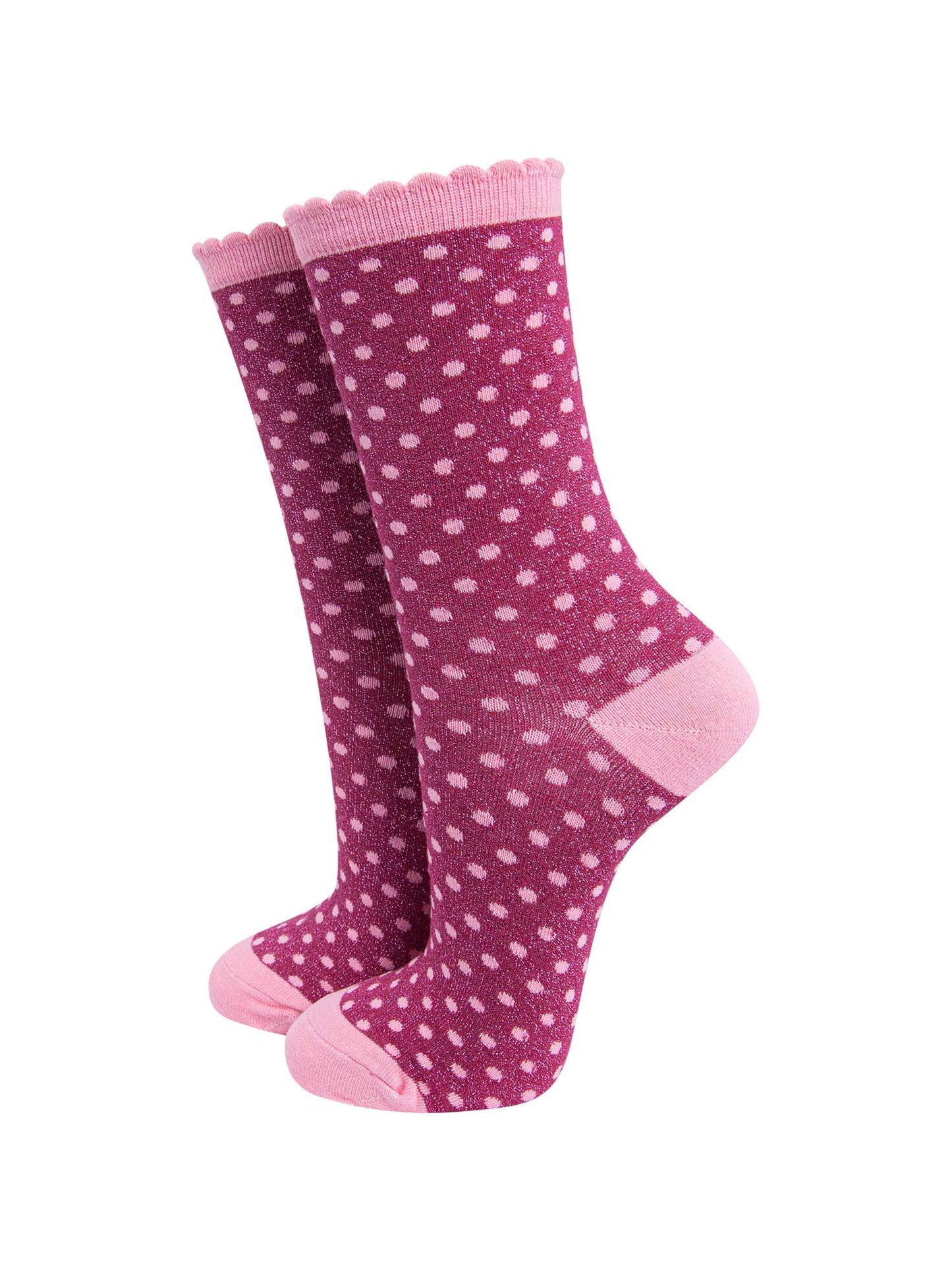 dark berry pink ankle socks with an all over pattern of small red polka dots