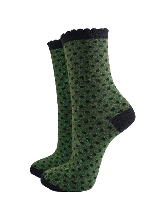 khaki green ankle socks with an all over pattern of small black polka dots
