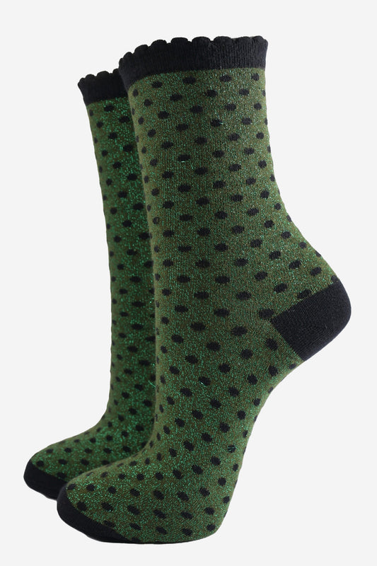 khaki green ankle socks with an all over pattern of small black polka dots