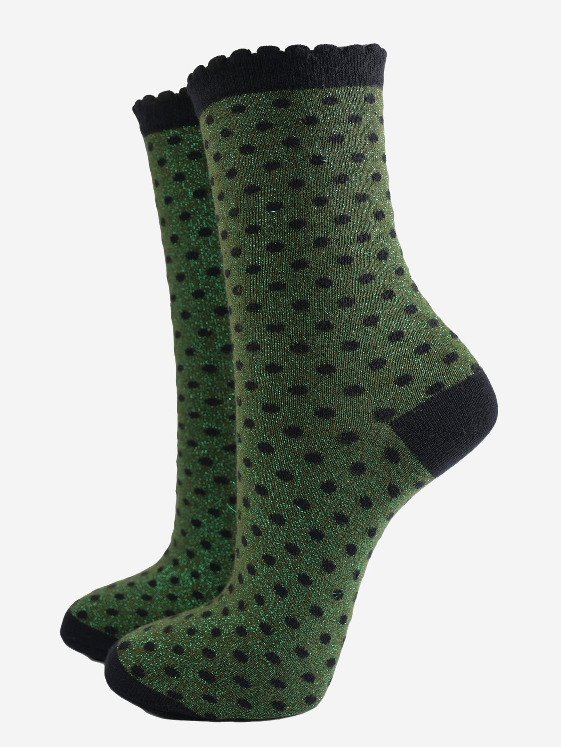 khaki green ankle socks with an all over pattern of small black polka dots