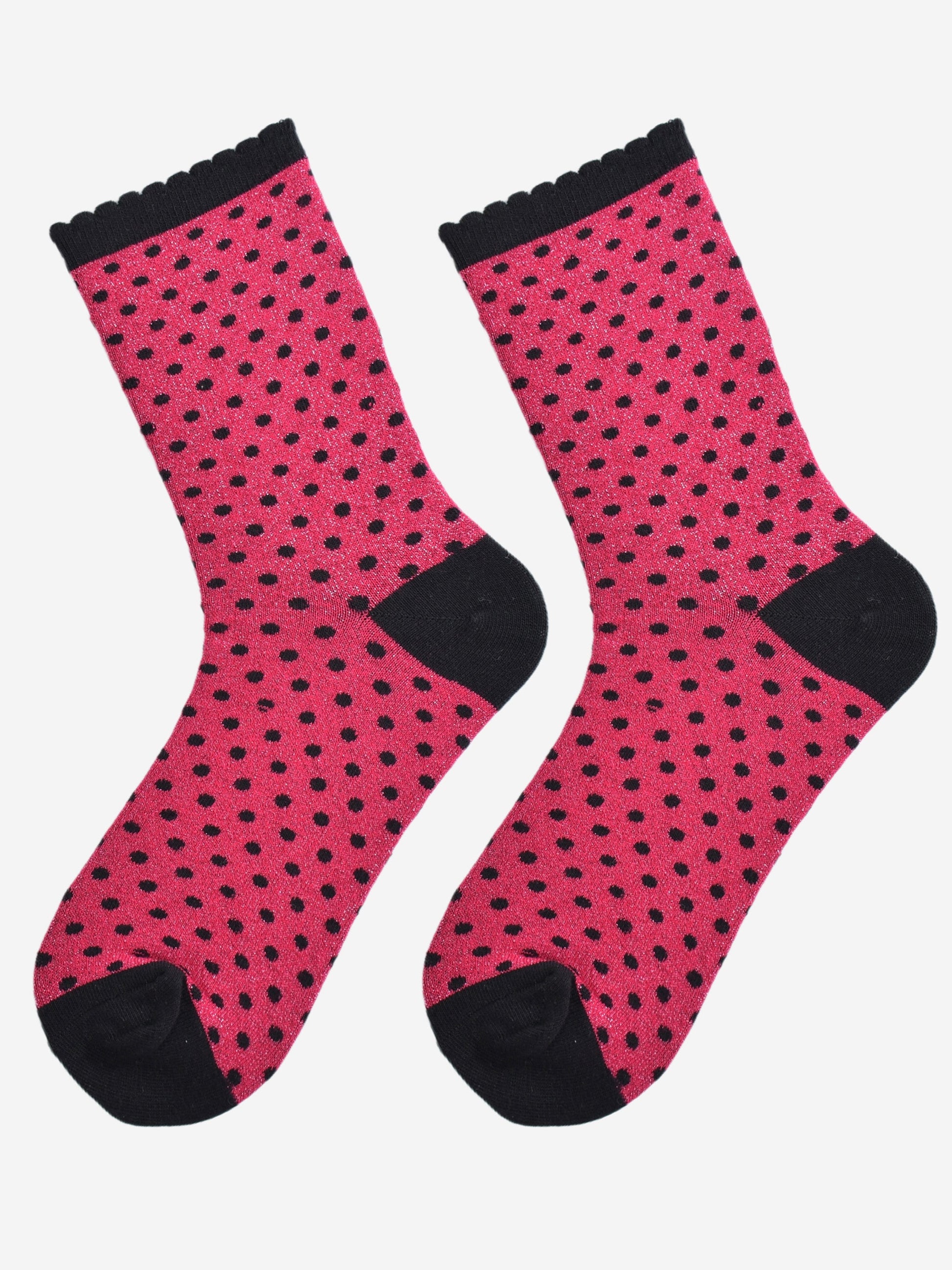 hot pink and black polka dot socks laying flat, showing the all over glitter sparkle