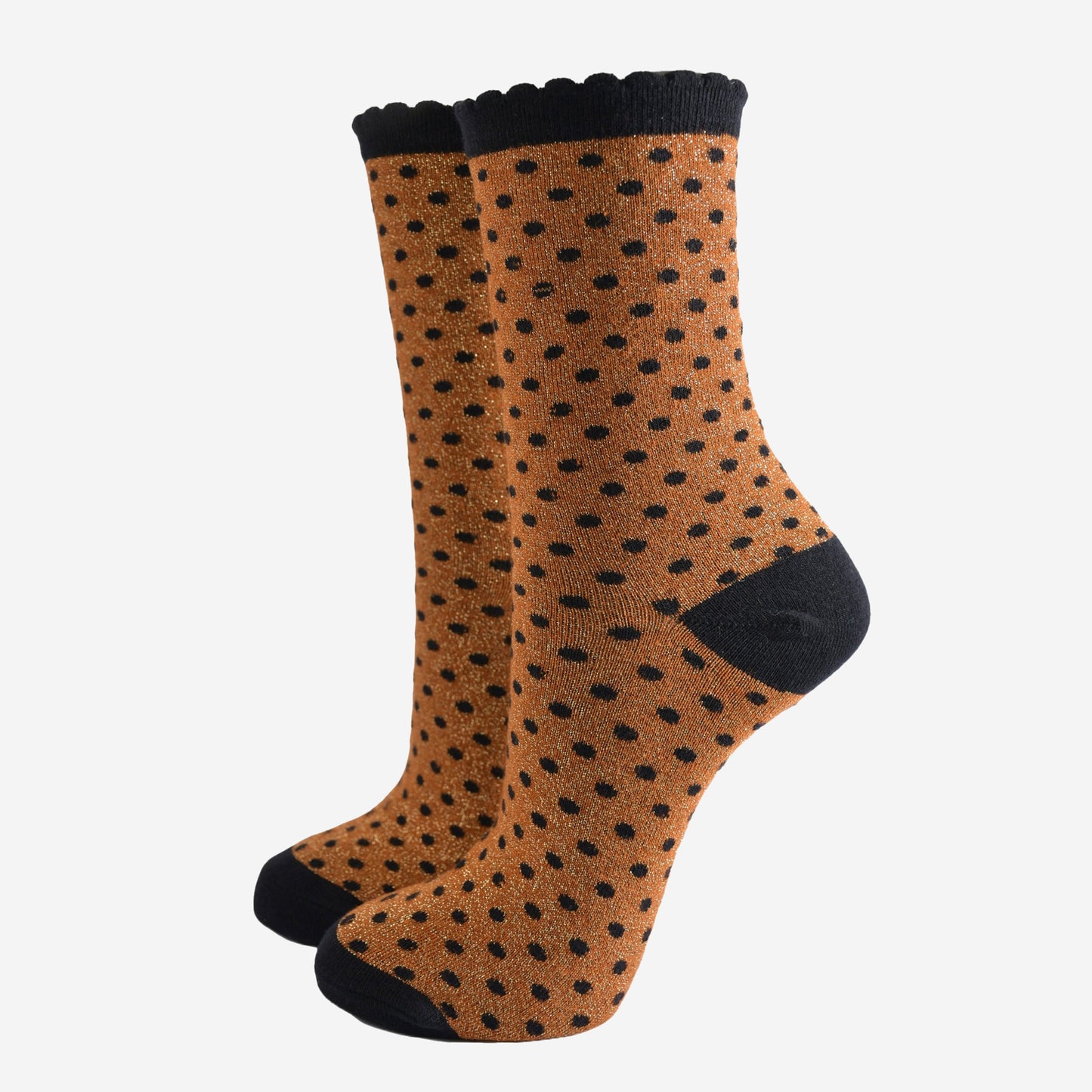 pumpkin orange ankle socks with an all over pattern of small black polka dots