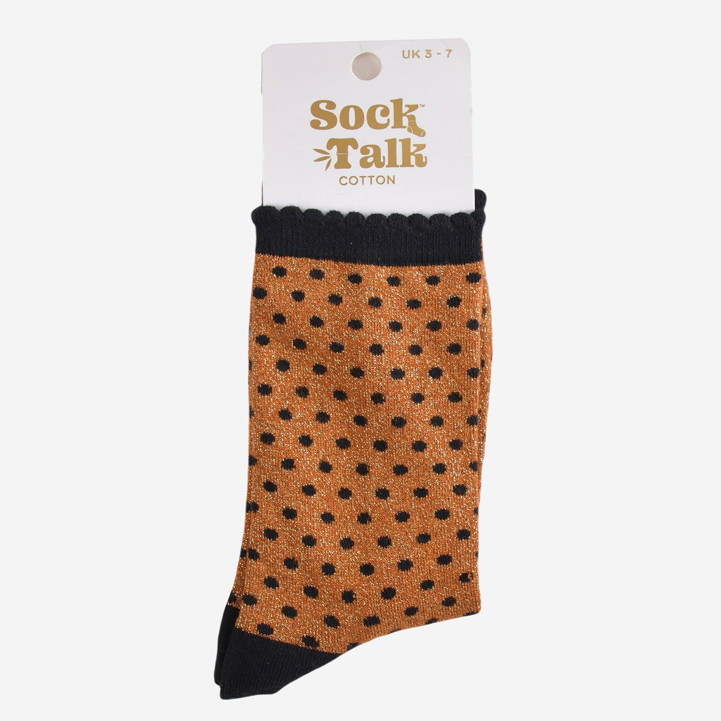 orange and black polka dot glitter socks in their sock talk packaging, the socks are a uk size 3-7