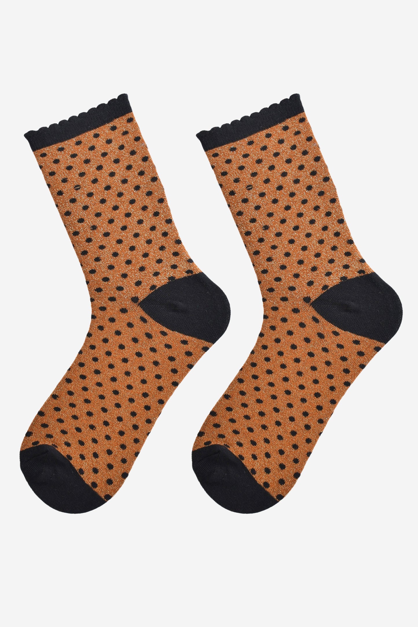 orange and black polka dot socks laying flat, showing the all over glitter sparkle