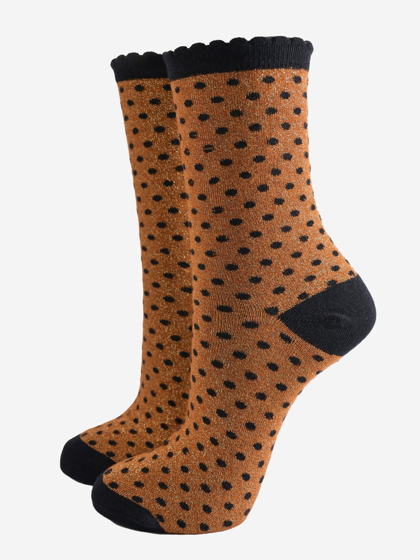 pumpkin orange ankle socks with an all over pattern of small black polka dots