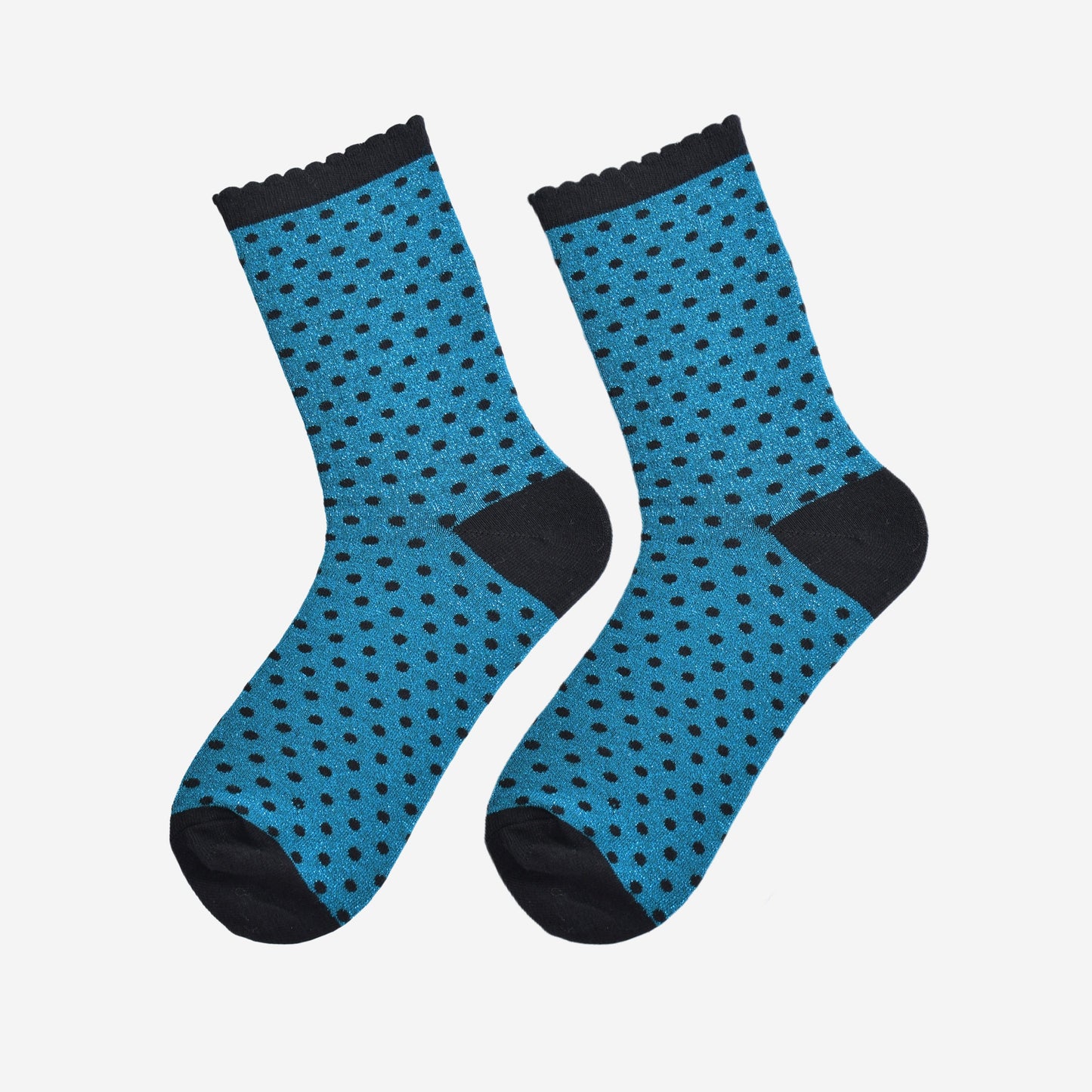 teal and black polka dot socks laying flat, showing the all over glitter sparkle