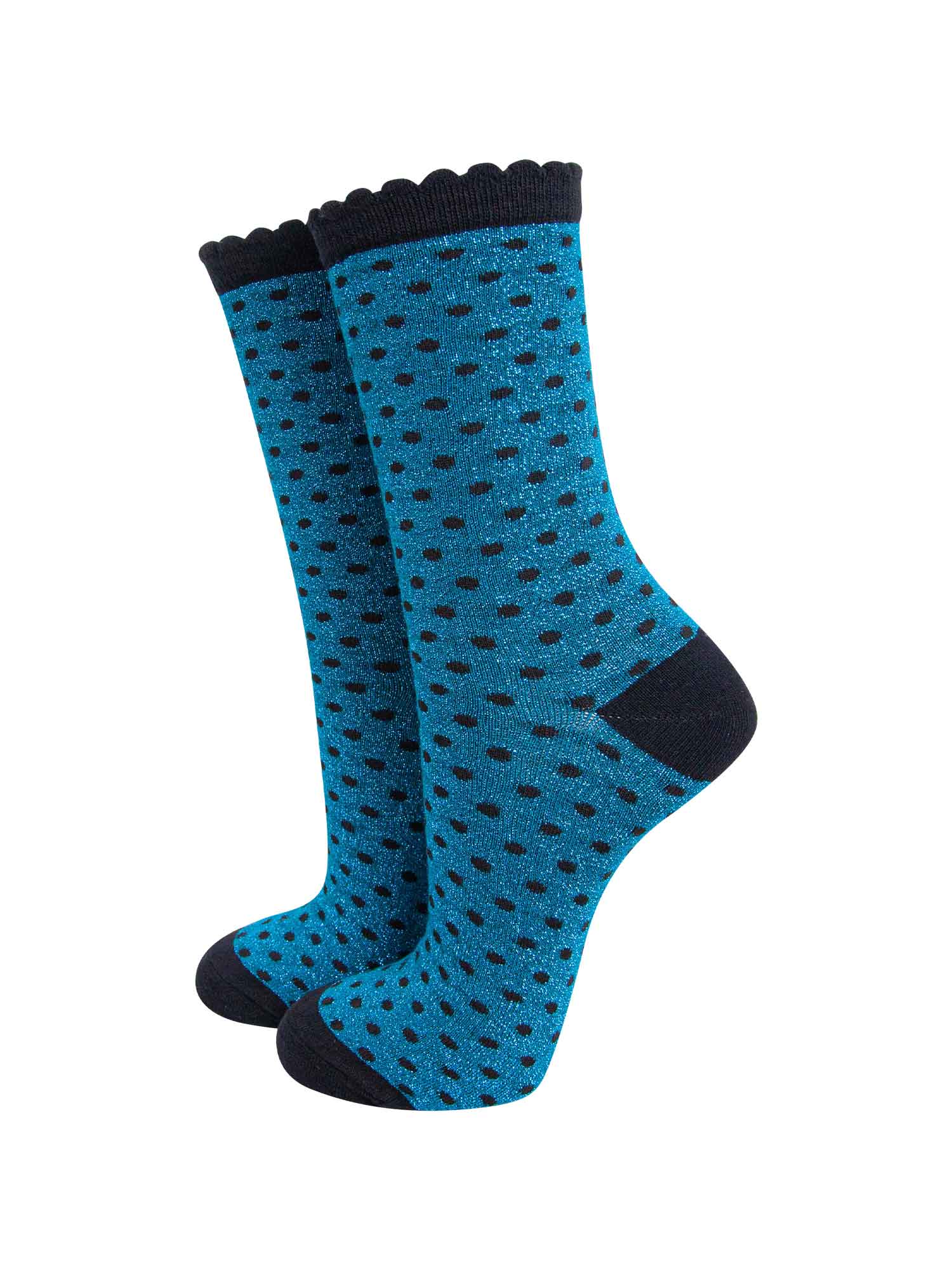teal blue ankle socks with an all over pattern of small black polka dots