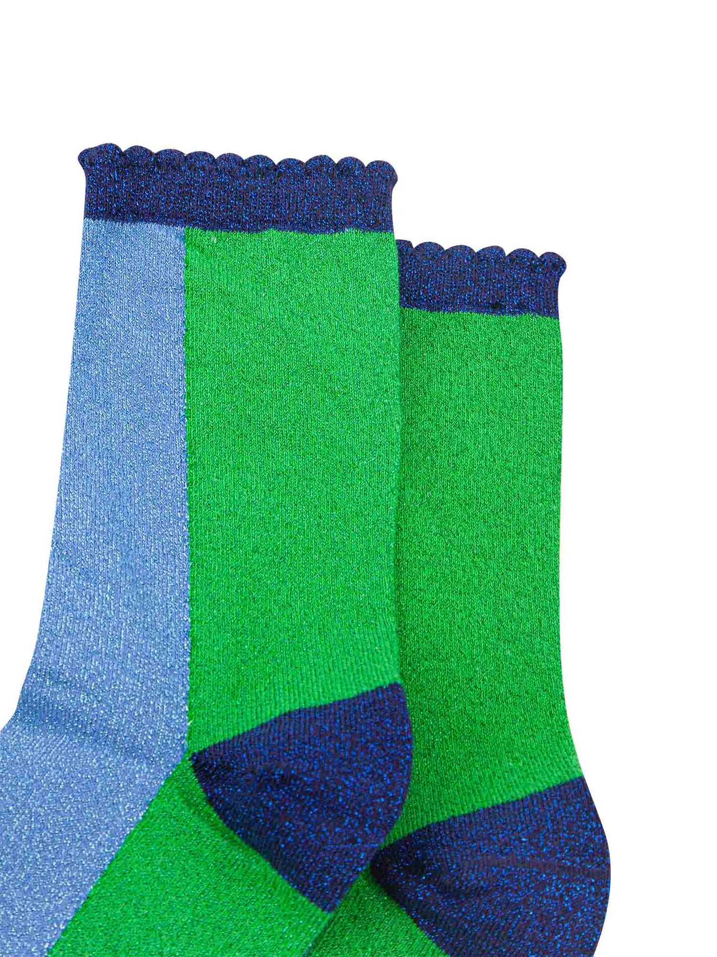 close up of the all over glitter sparkle on these colourful green and blue glitter socks