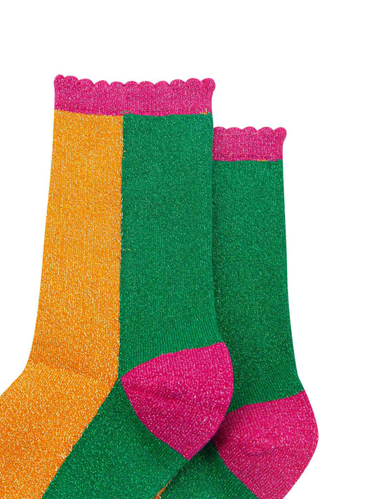 orange and green colour block socks with pink heel, toe and cuff with an all over glitter sparkle and scalloped edge