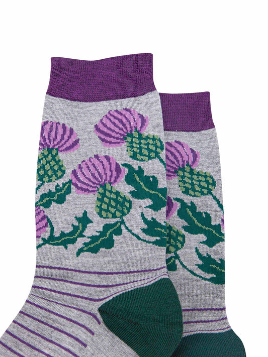 close up of the scottish thistle design on the ankle of the socks