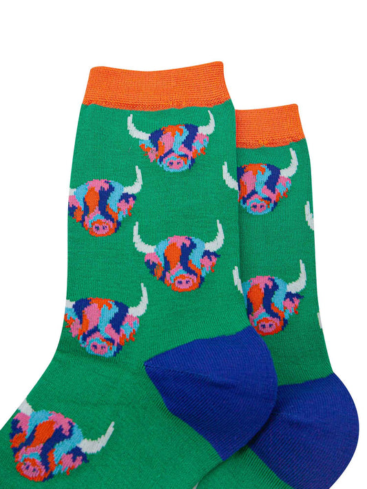 green bamboo socks with orange cuff and blue heel with an all over pattern of multicoloured highland cow faces