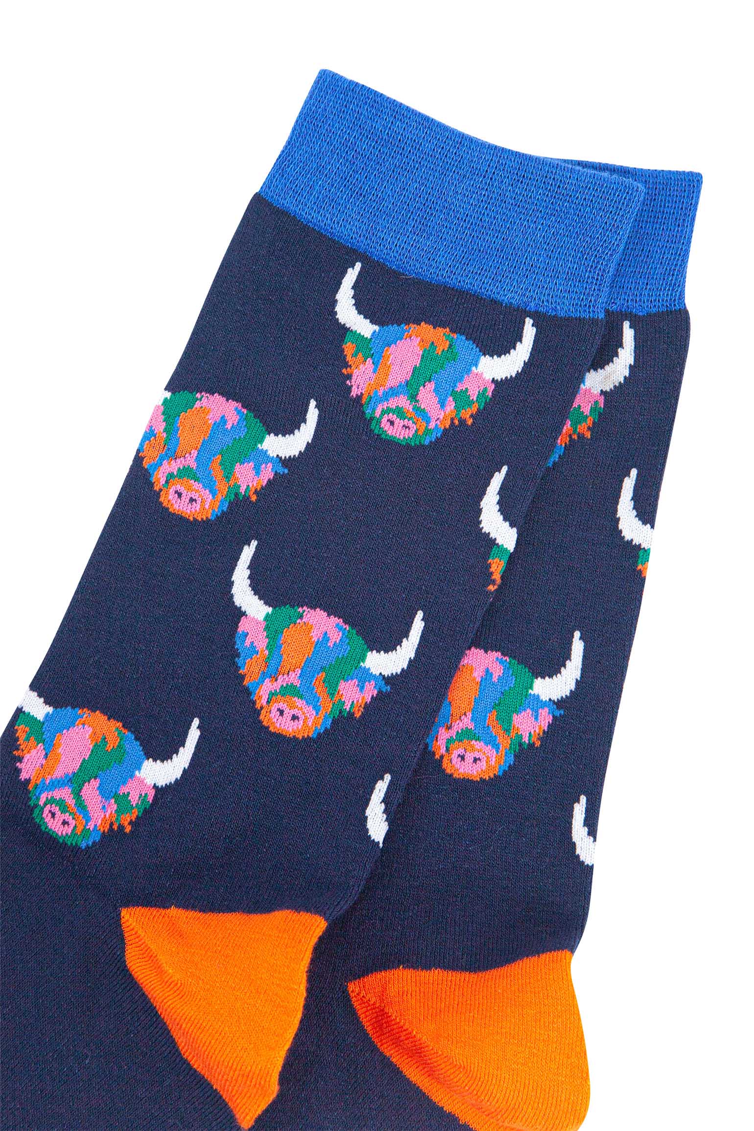 mens navy blue bamboo socks with an all over pattern of rainbow coloured highland cows