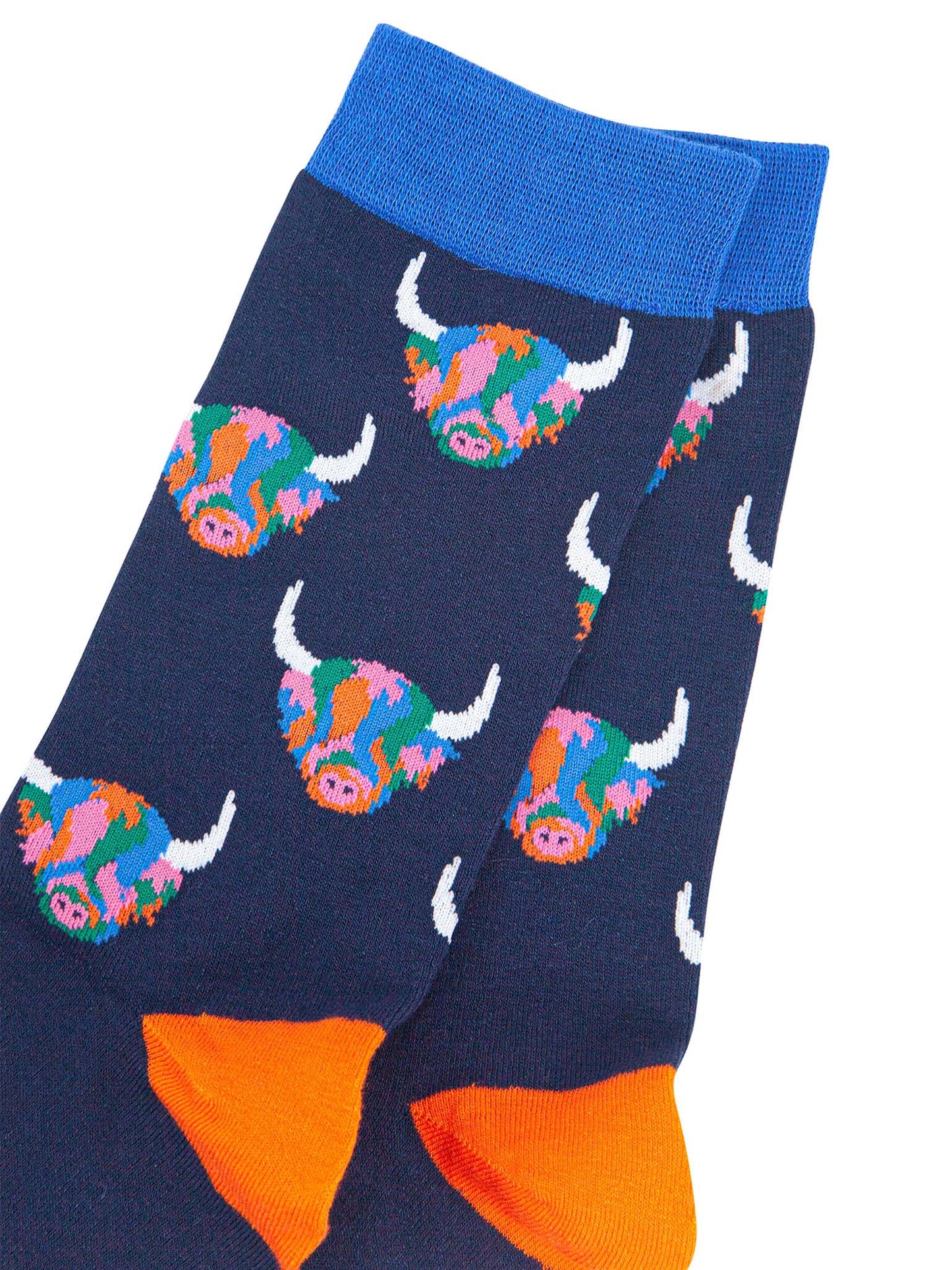 mens navy blue bamboo socks with an all over pattern of rainbow coloured highland cows