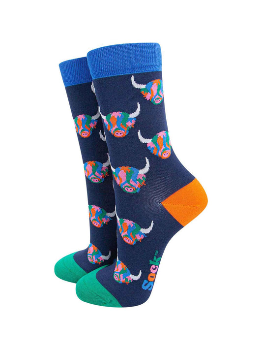 navy blue dress socks with an all over pattern of multicoloured highland cows