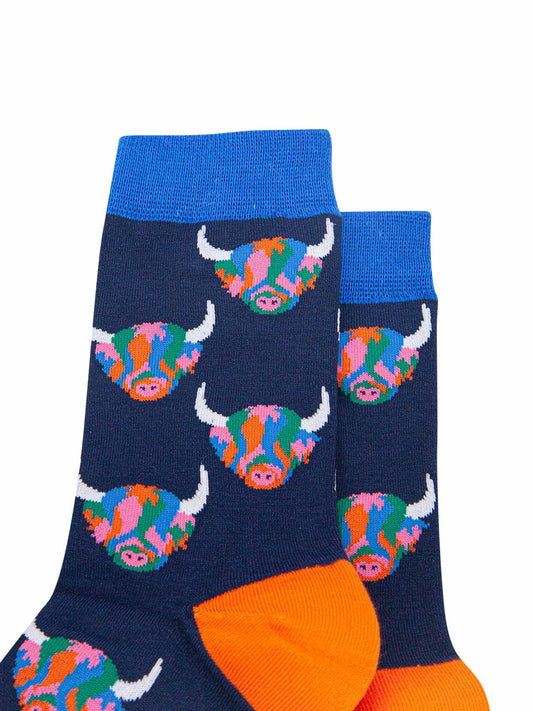 mens navy blue bamboo socks with an all over pattern of rainbow coloured highland cows