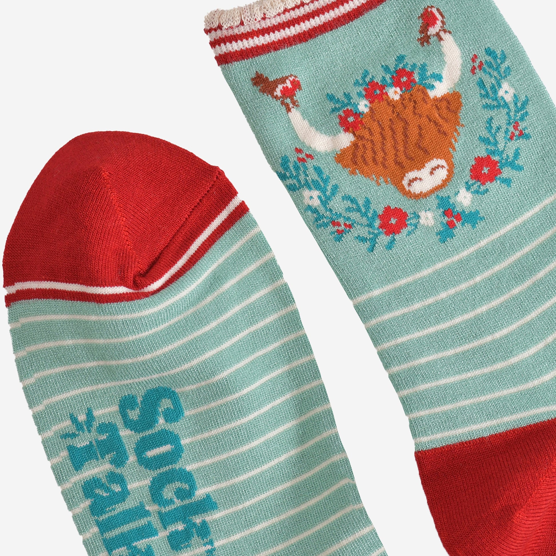 close up of the toe and cuff of the bamboo socks, the toe is red and the cuff is scalloped with red and cream stripes