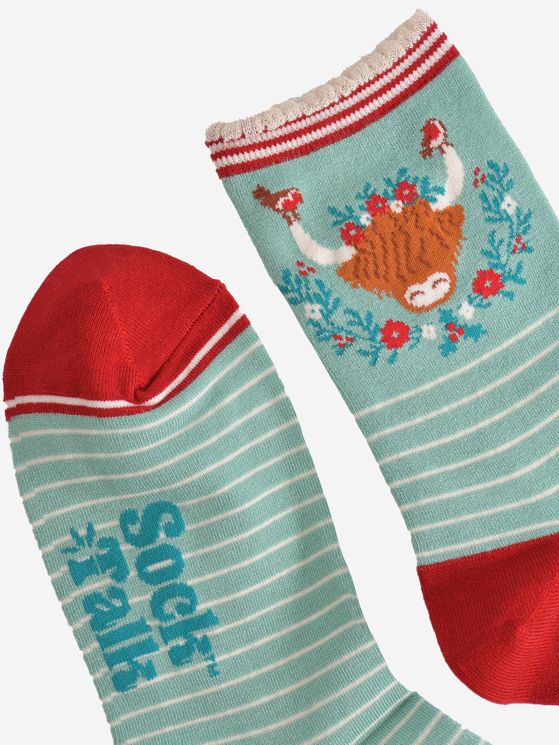 close up of the toe and cuff of the bamboo socks, the toe is red and the cuff is scalloped with red and cream stripes