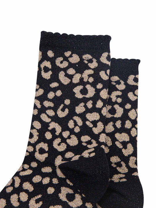 black ankle socks with a gold leopard print pattern, all over glitter sparkle and black scalloped cuff