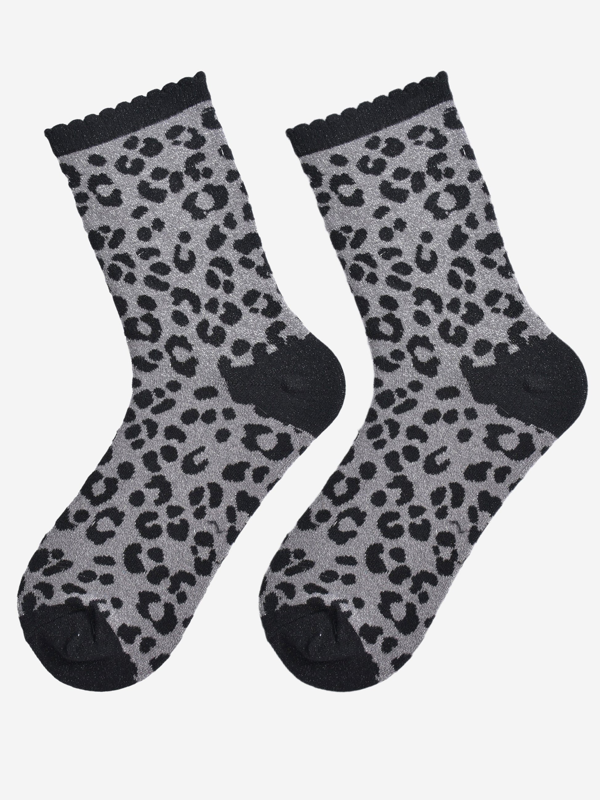 showing the grey and black leopard print glitter socks laying flat, the all over glitter sparkle is visible