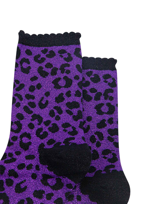 purple ankle socks with a black leopard print pattern, all over glitter sparkle and black scalloped cuff