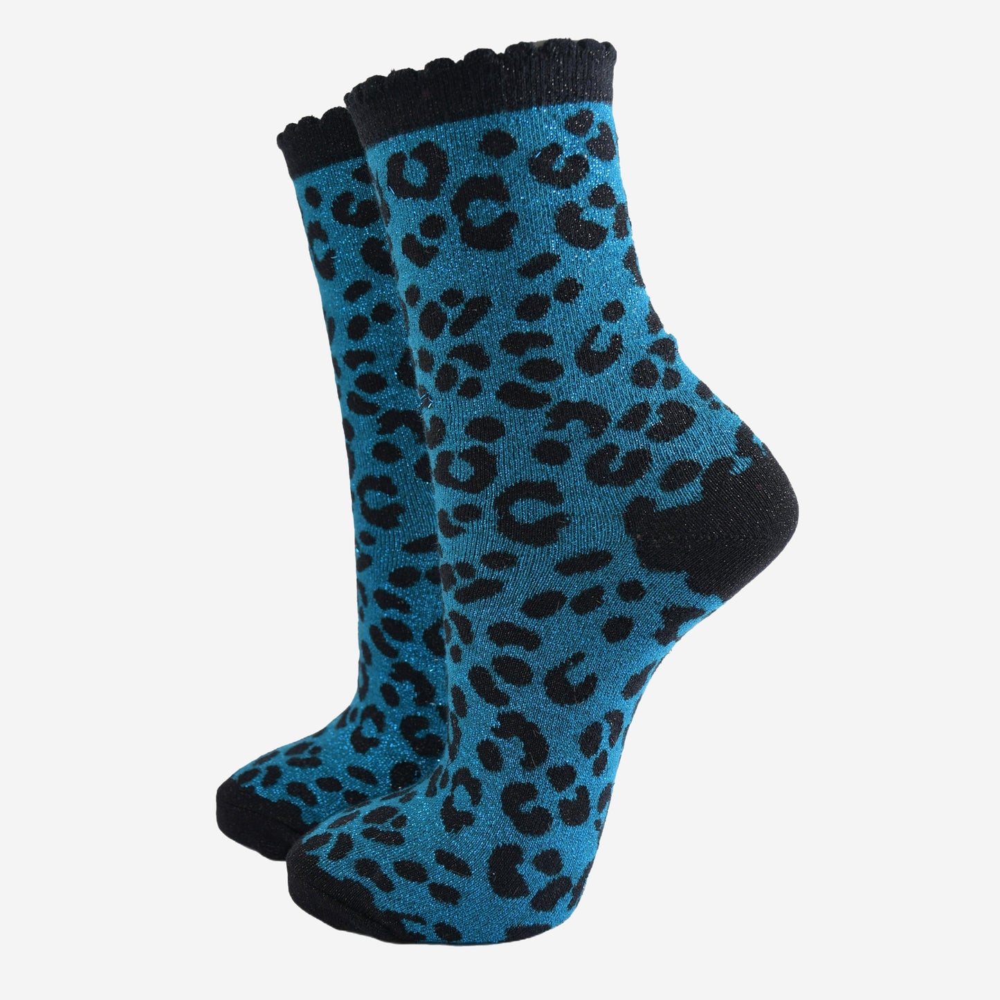 teal ankle socks with a black leopard print pattern, all over glitter sparkle and black scalloped cuff