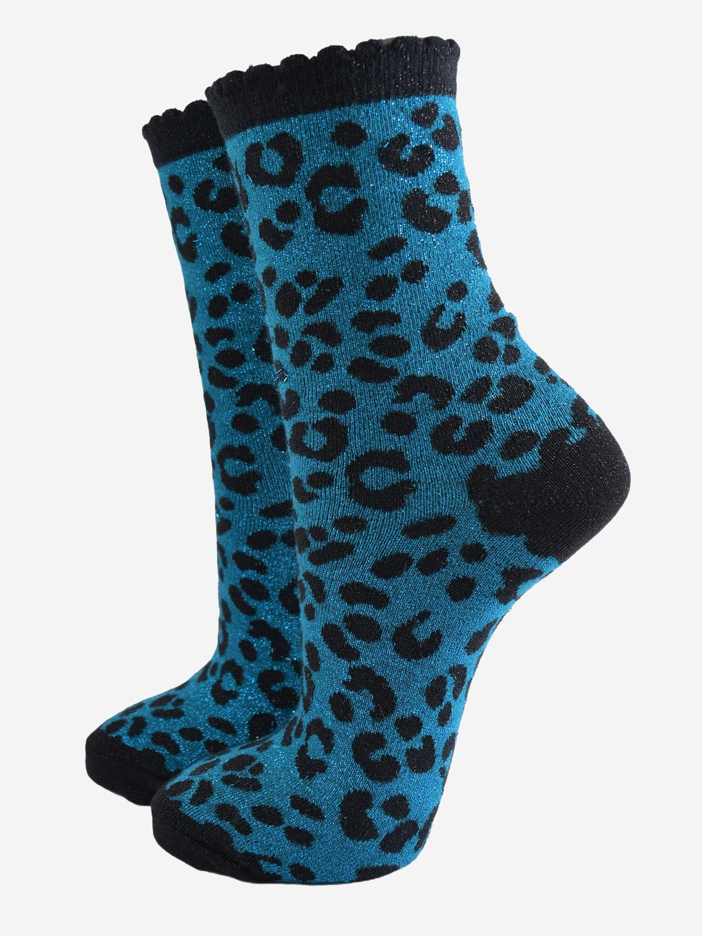 teal ankle socks with a black leopard print pattern, all over glitter sparkle and black scalloped cuff