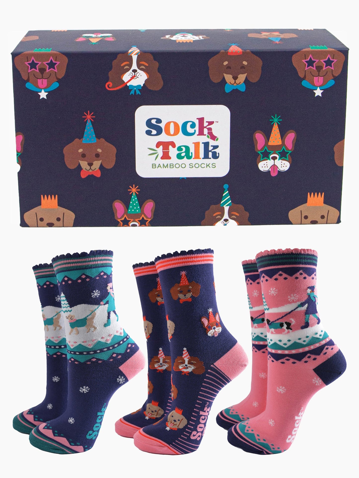 three pairs of winter and festive themed dog socks with a dog patterned gift box