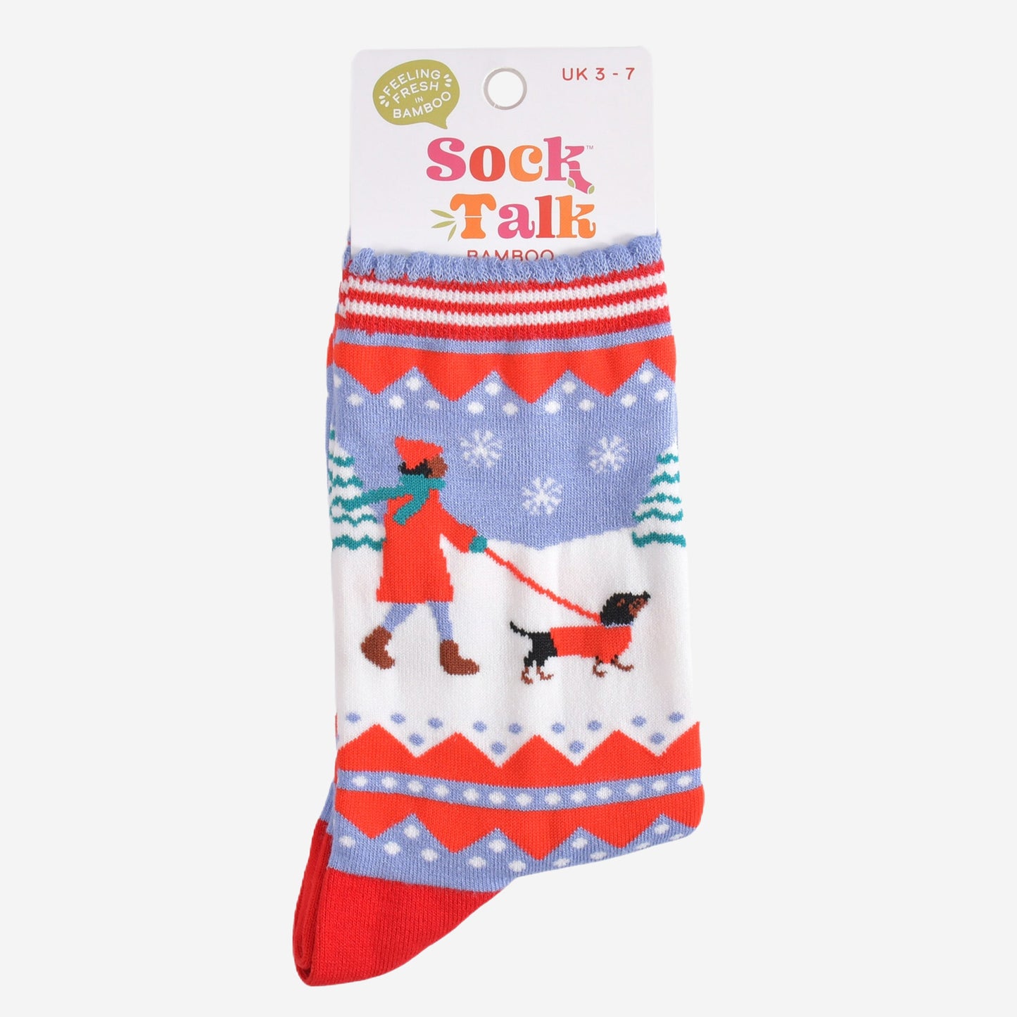 sausage dog winter walk bamboo socks in their sock talk packaging, these socks are a uk size 3-7