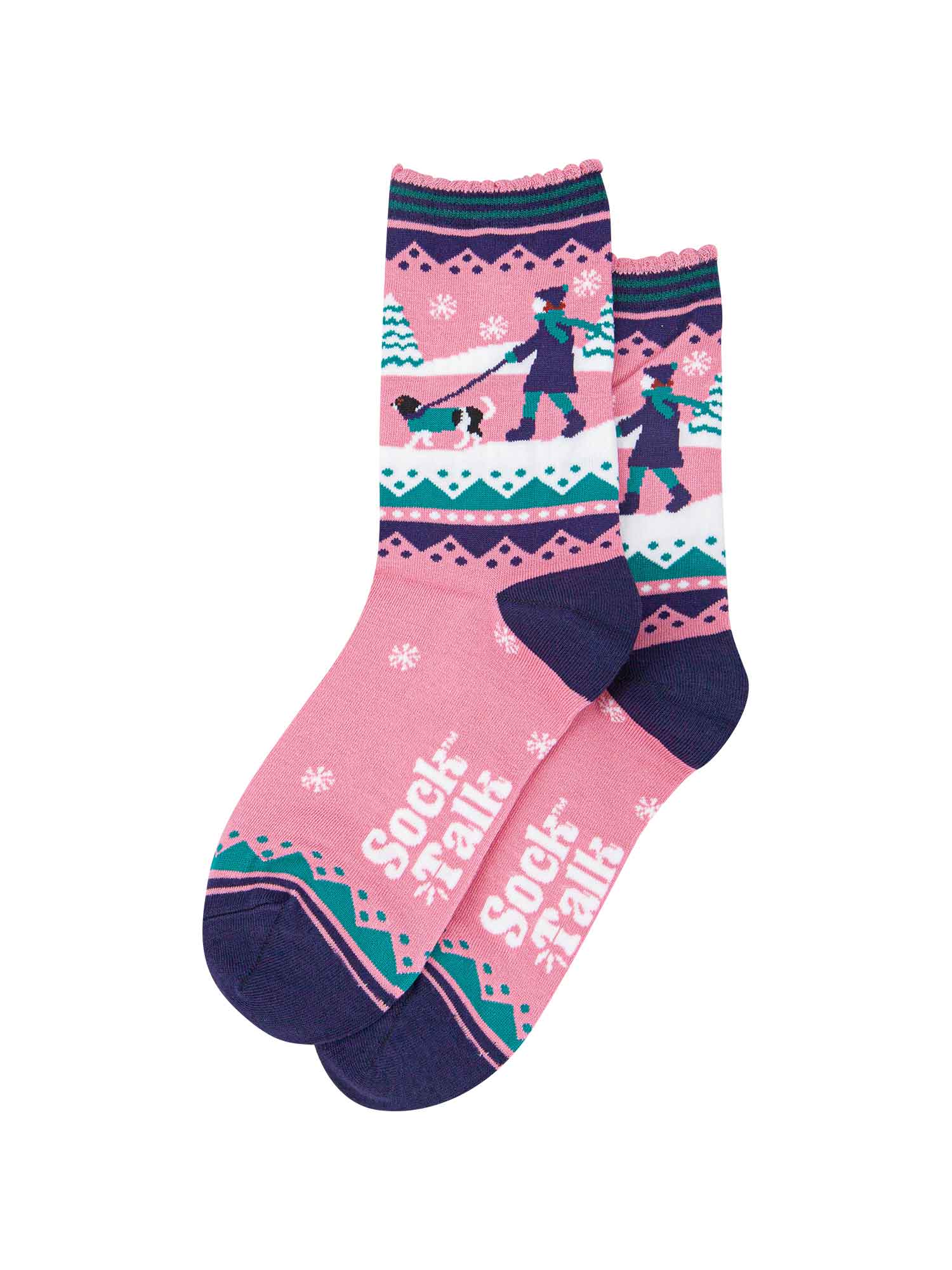 pink ankle socks with blue and green accents, showing a snowy winter scene with a woman walking a king charles spaniel
