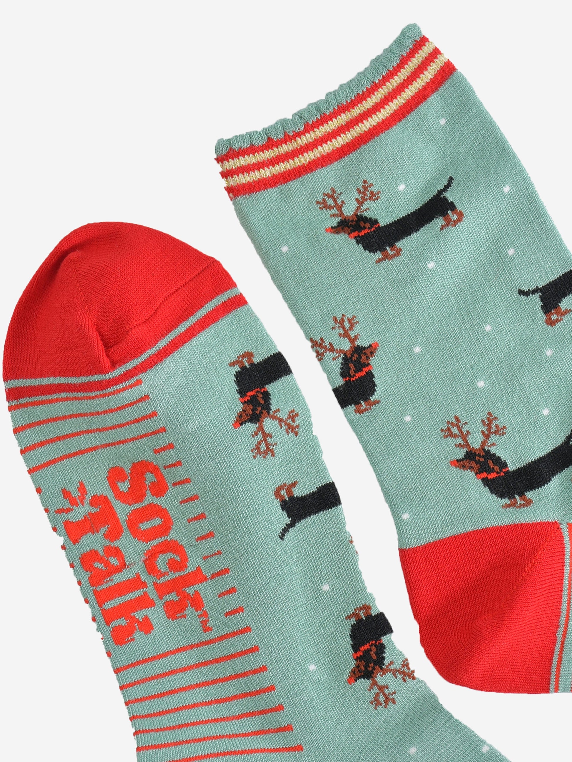 close up of the toe and cuff, the toe is red with a green border stripe, the cuff has a scalloped edge and has red and gold stripes