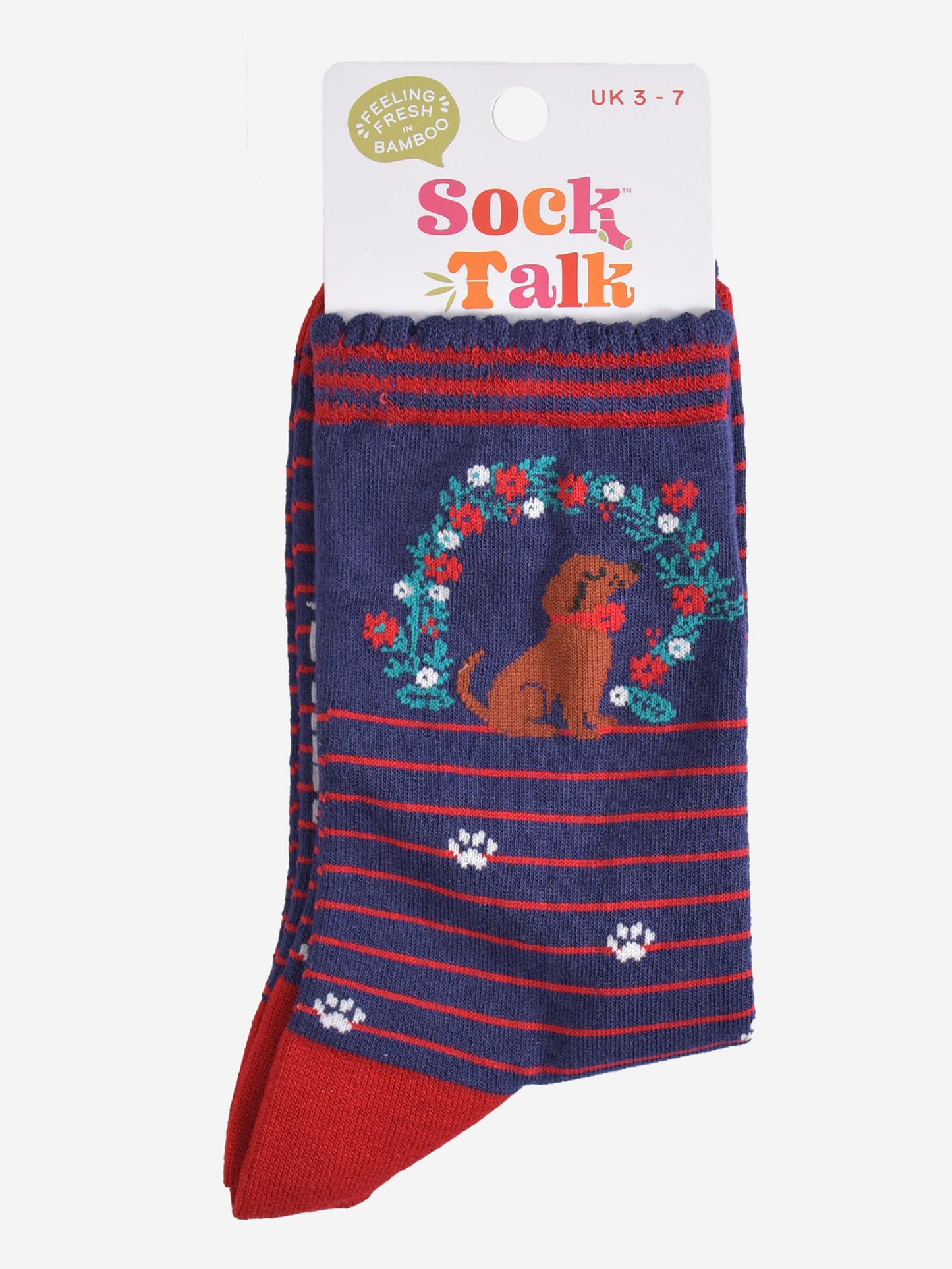 navy sausage dog and wreath bamboo socks in their sock talk packaging, these socks are a uk size 3-7