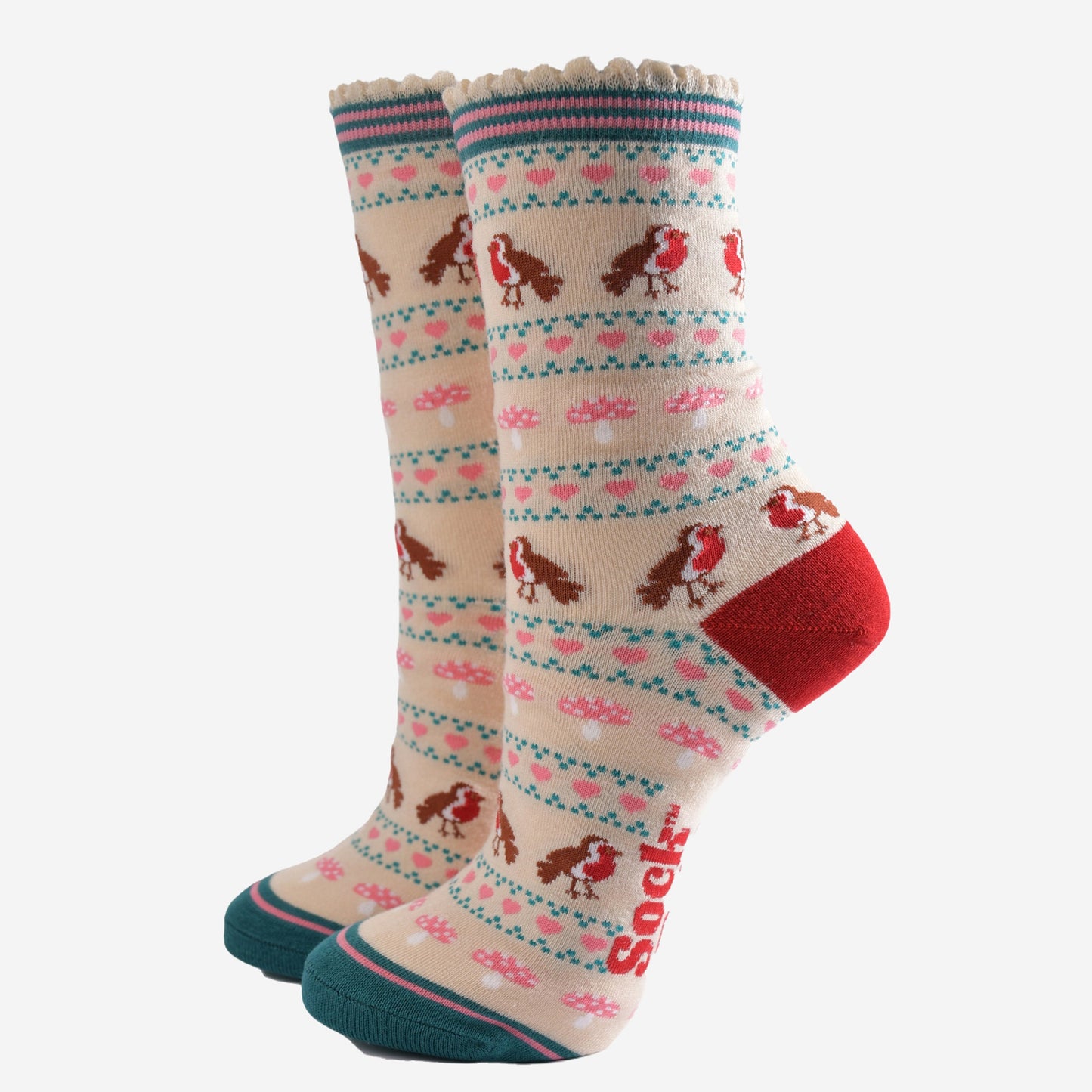 cream bamboo socks with a fair isle style pattern featuring red robin birds, pink toad stools and pink love hearts