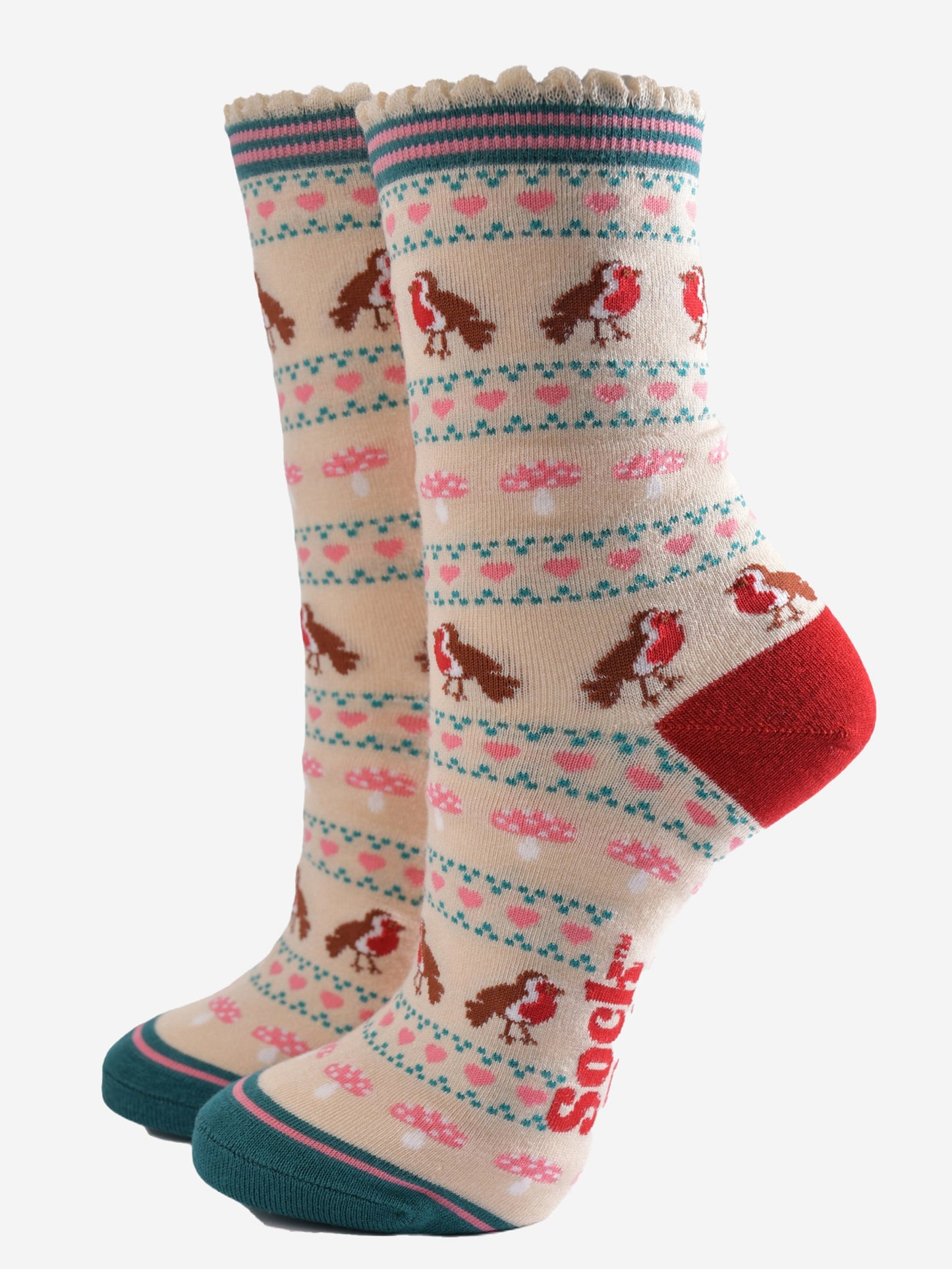 cream bamboo socks with a fair isle style pattern featuring red robin birds, pink toad stools and pink love hearts