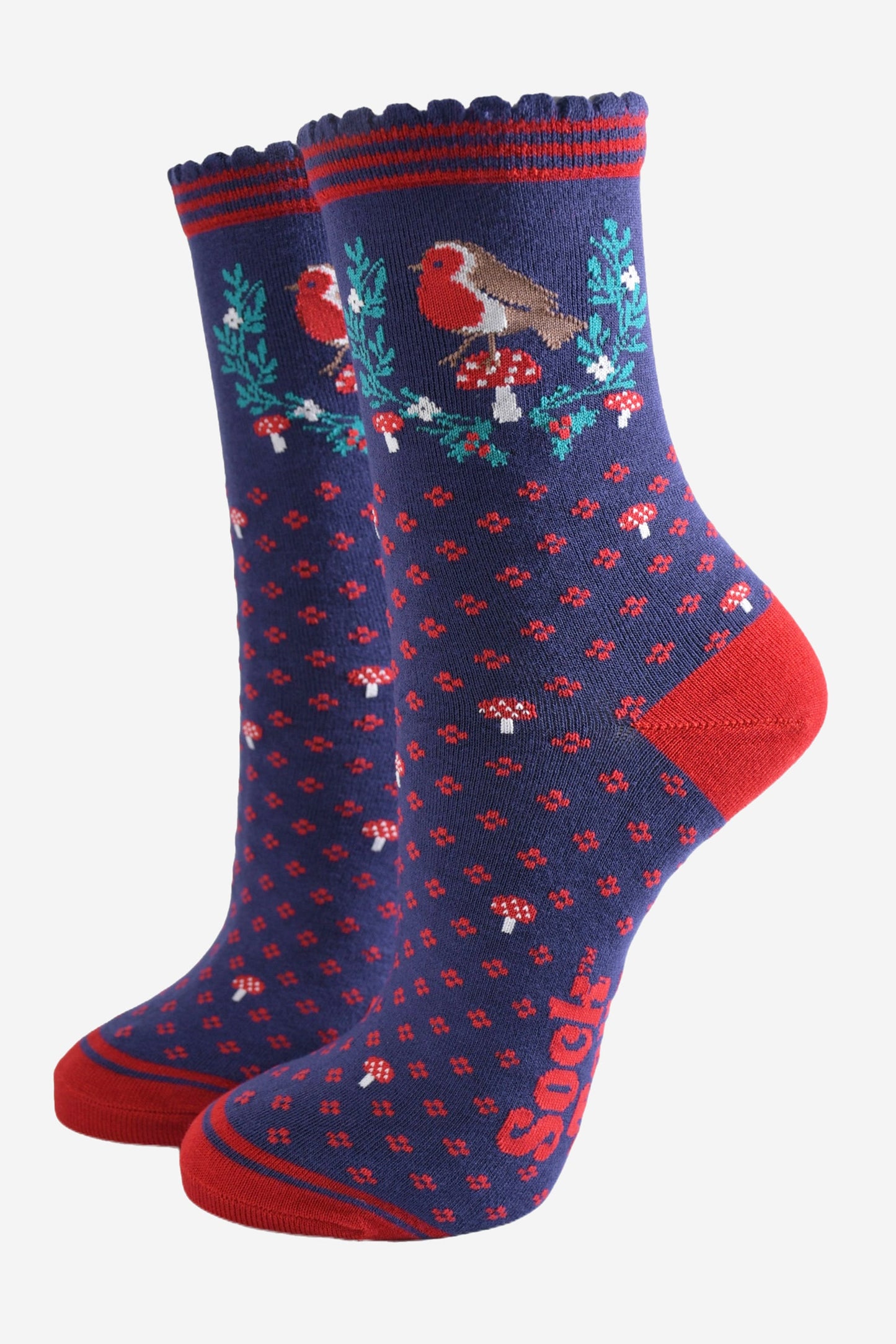 navy blue and red bamboo socks with a garland of festive holly, red robin bird and red toadstools 