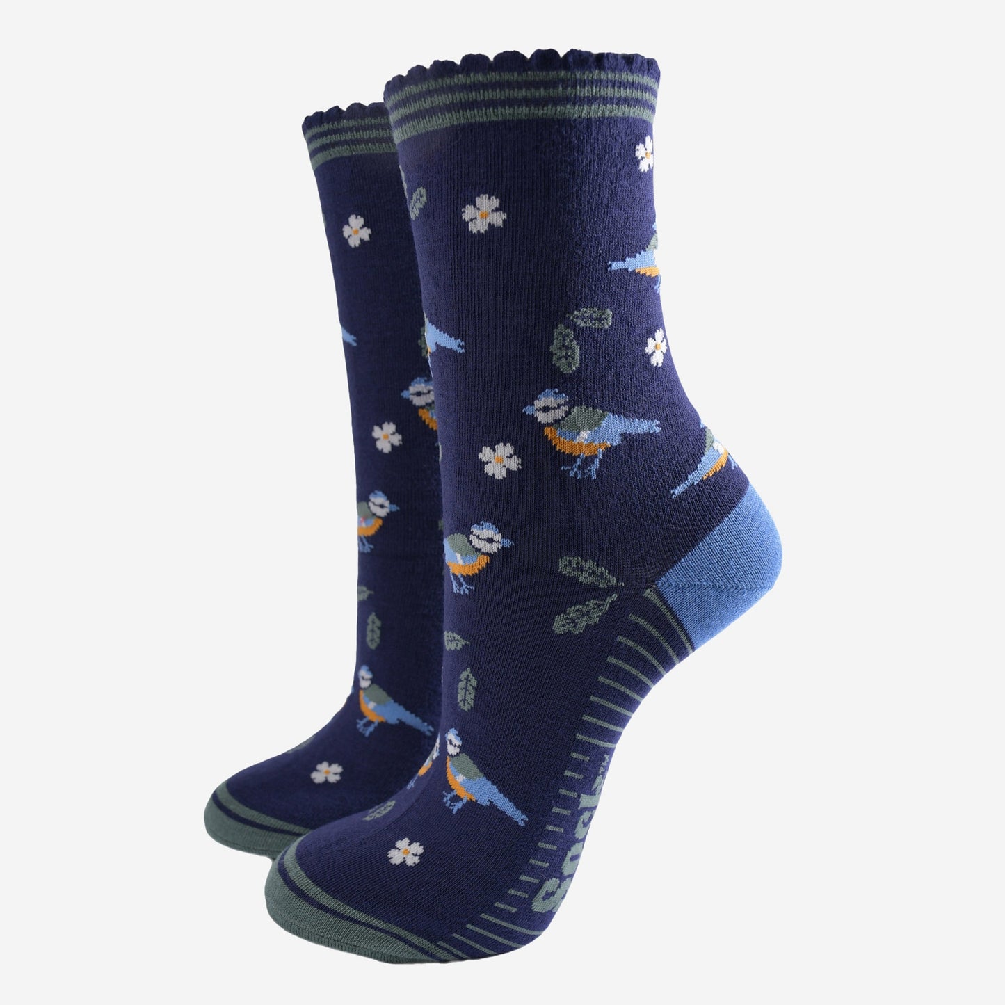 navy blue ankle socks with a pattern of blue tit garden birds, leaves and flowers, the socks have a striped green scalloped cuff