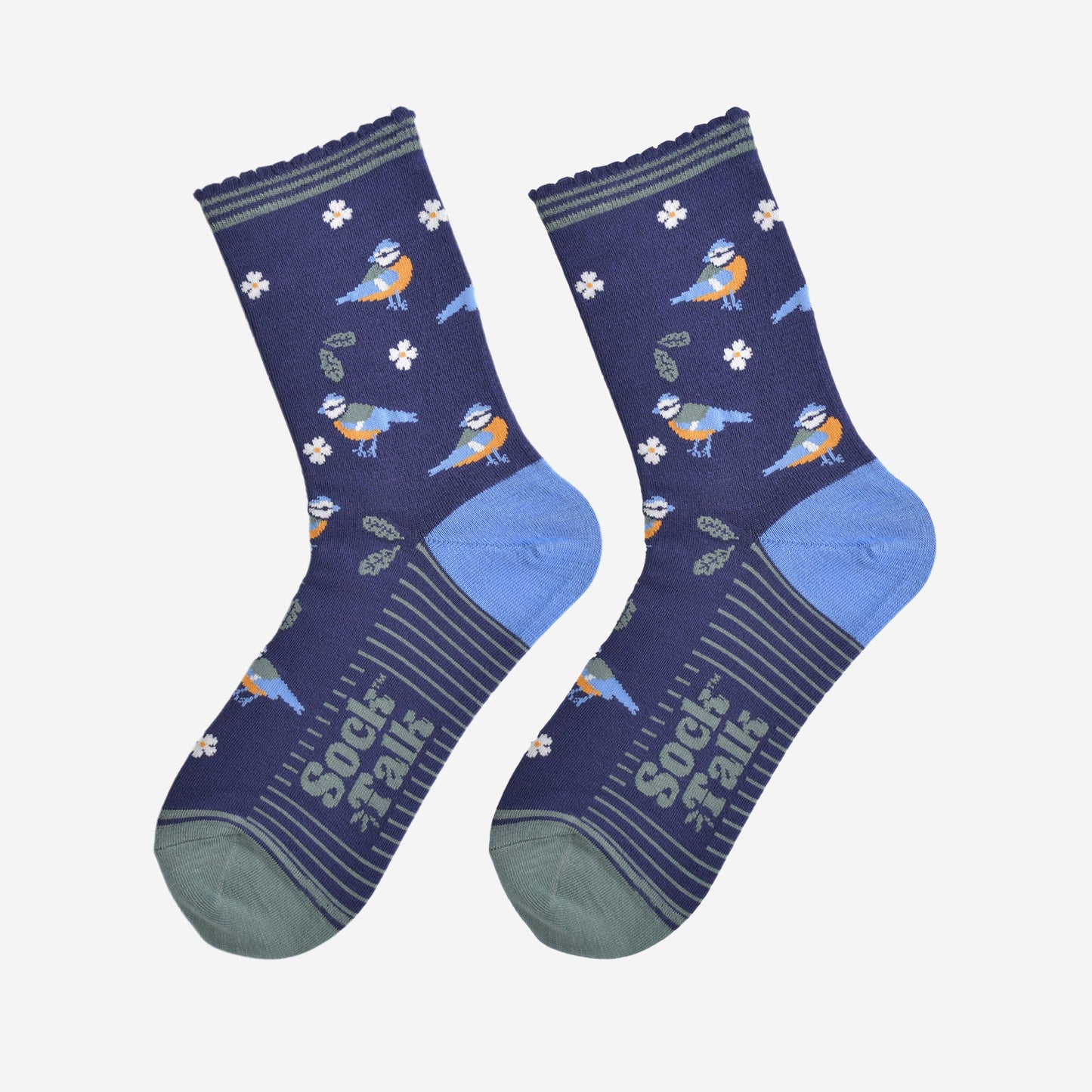 blue tit woodland bamboo socks laying flat, showing the all over pattern of birds, leaves and flowers on a navy blue background