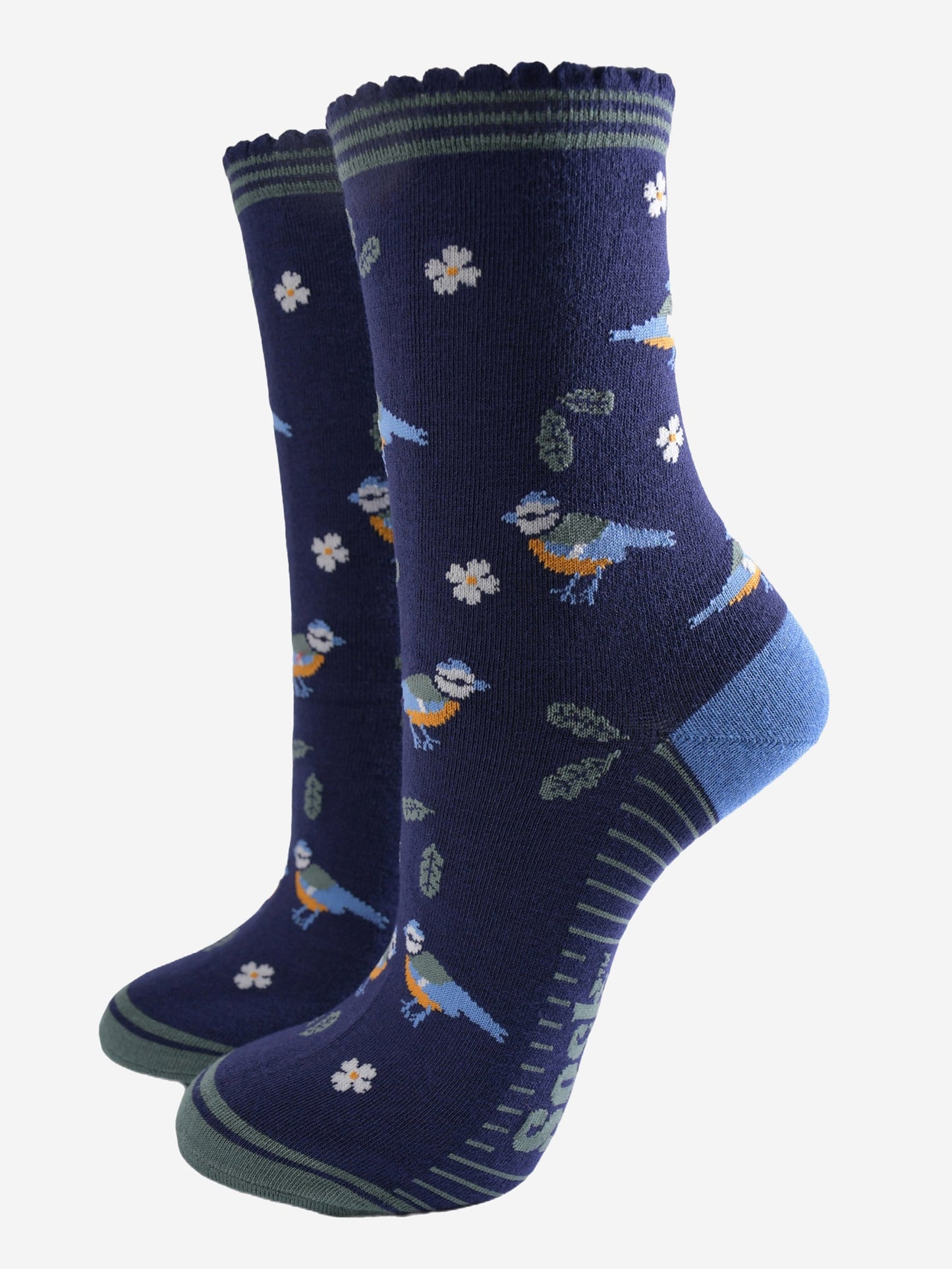 navy blue ankle socks with a pattern of blue tit garden birds, leaves and flowers, the socks have a striped green scalloped cuff