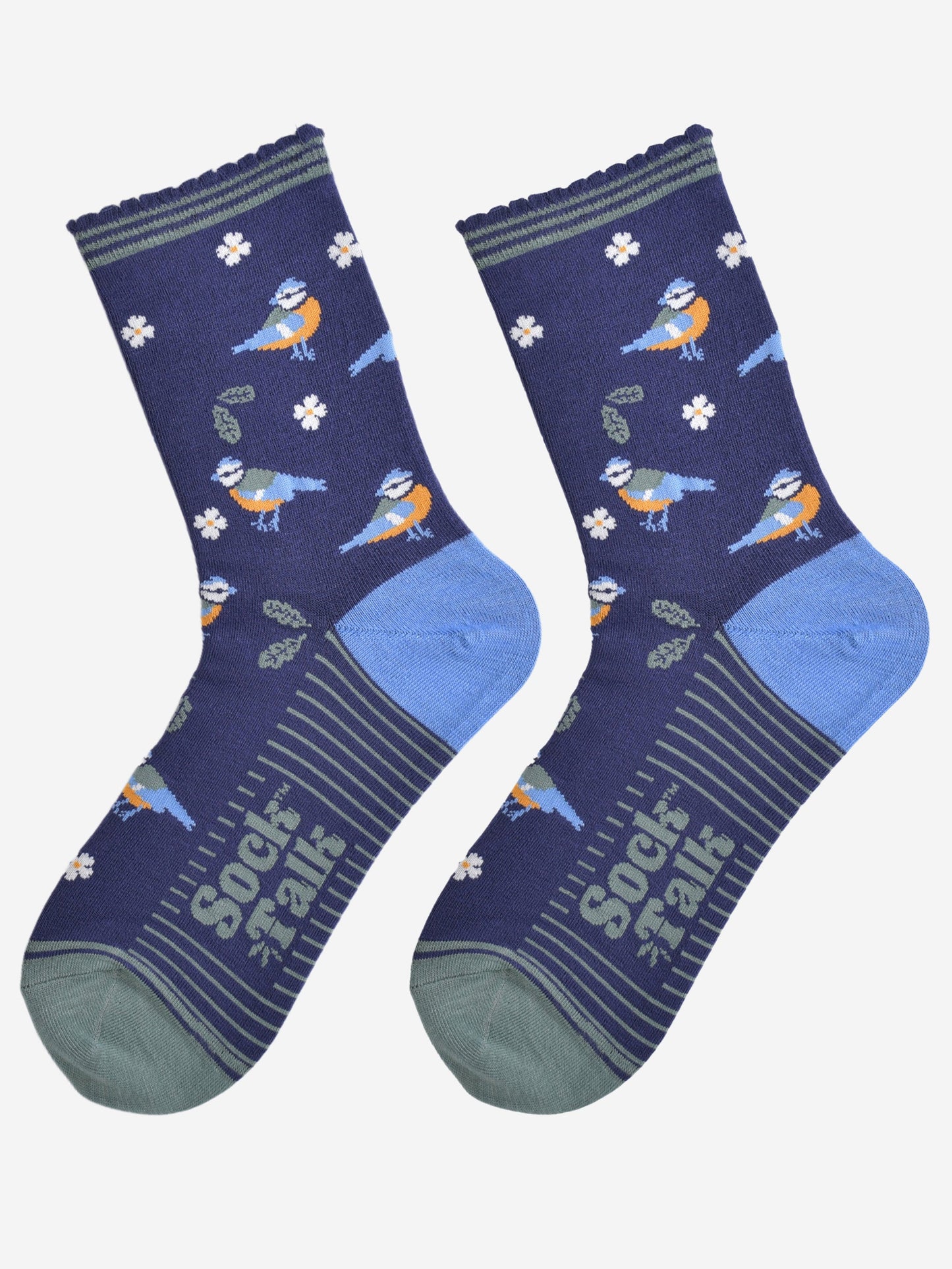 blue tit woodland bamboo socks laying flat, showing the all over pattern of birds, leaves and flowers on a navy blue background