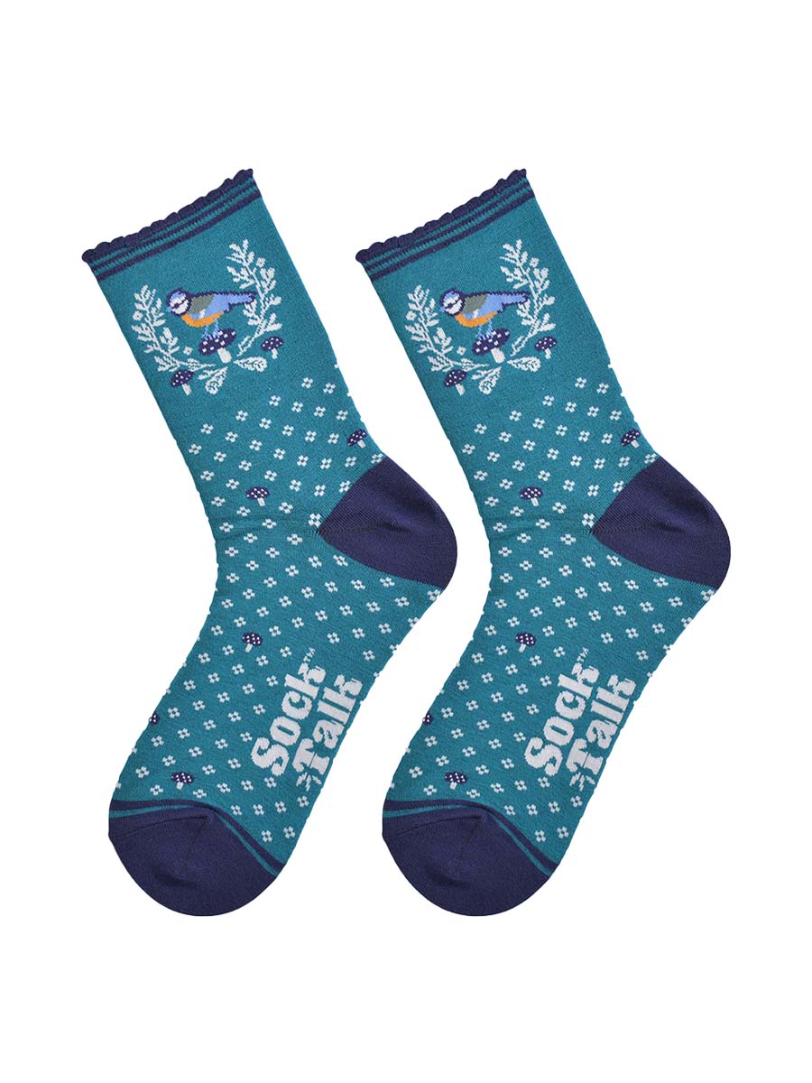 showing the blue tit wreath socks laying flat, detailing the all over floral pattern, wreath and blue tit bird