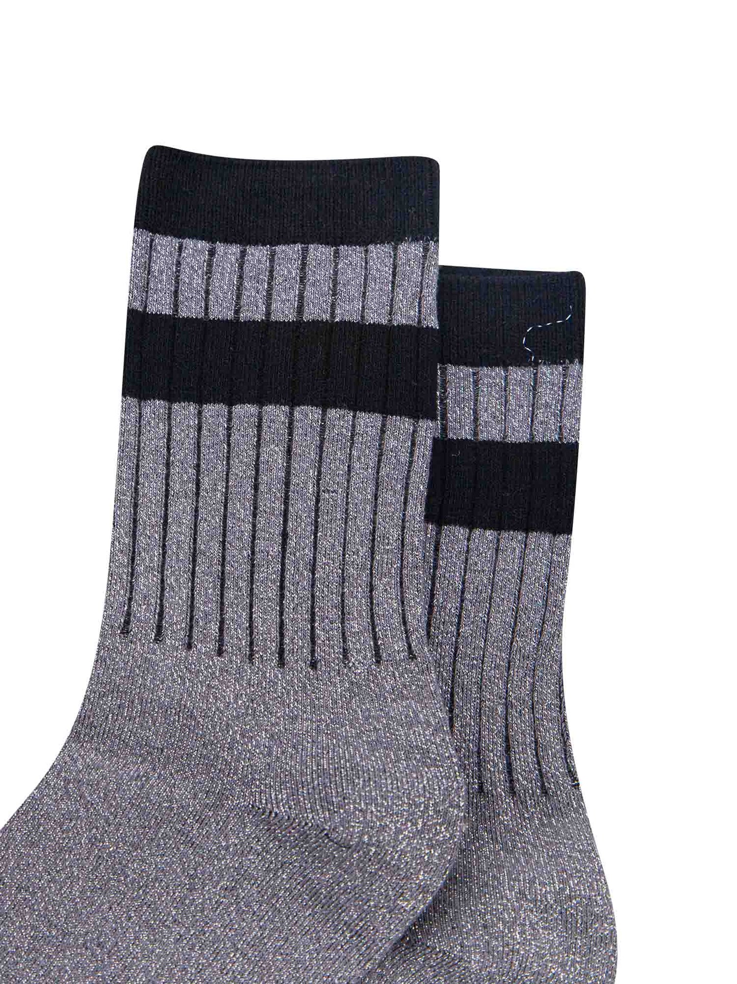close up of the ribbed sports style cuffs on the socks. they have vertical ribbed details. the base of the socks are grey with a silver glitter sparkle. the cuff is black and there is a horizontal black band stripe, without glitter an inch below the cuff. 