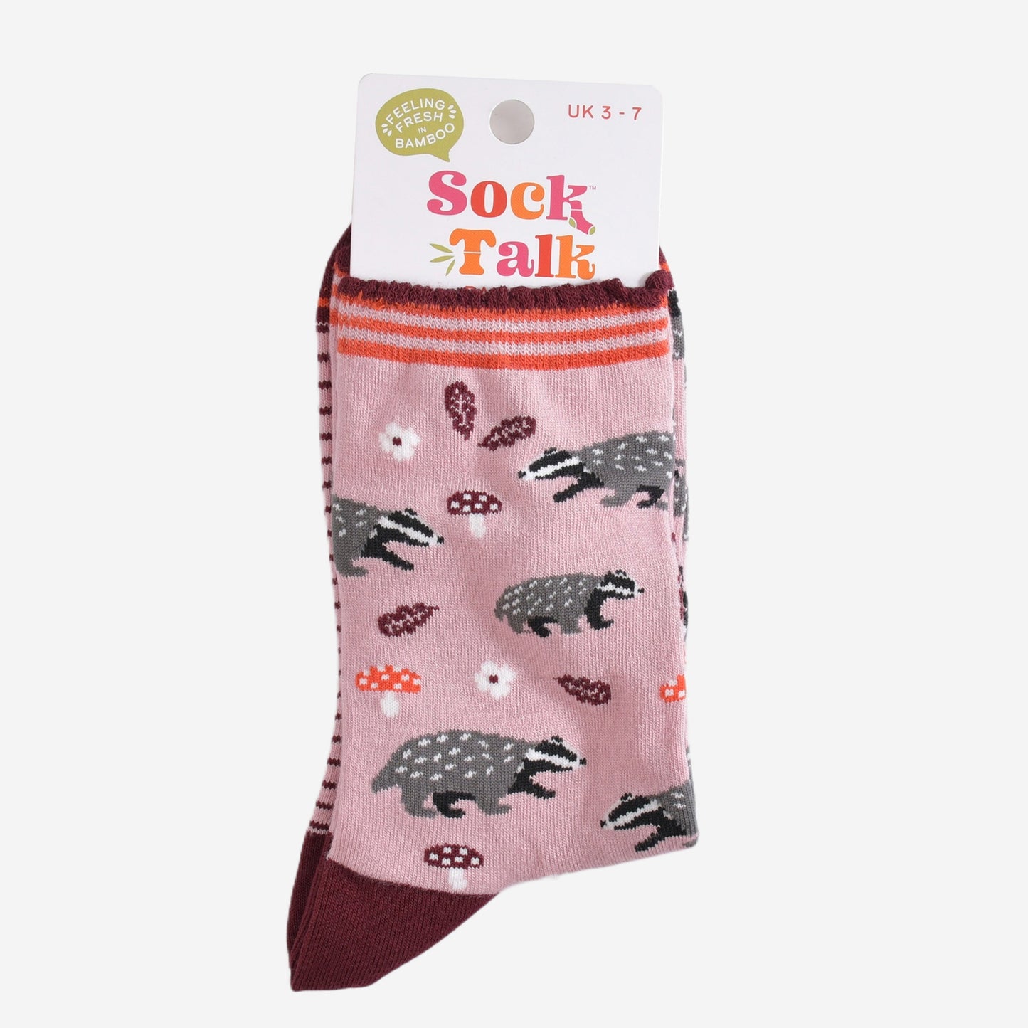 pink woodland badger bamboo socks in their sock talk packaging, the socks are a uk size 3-7