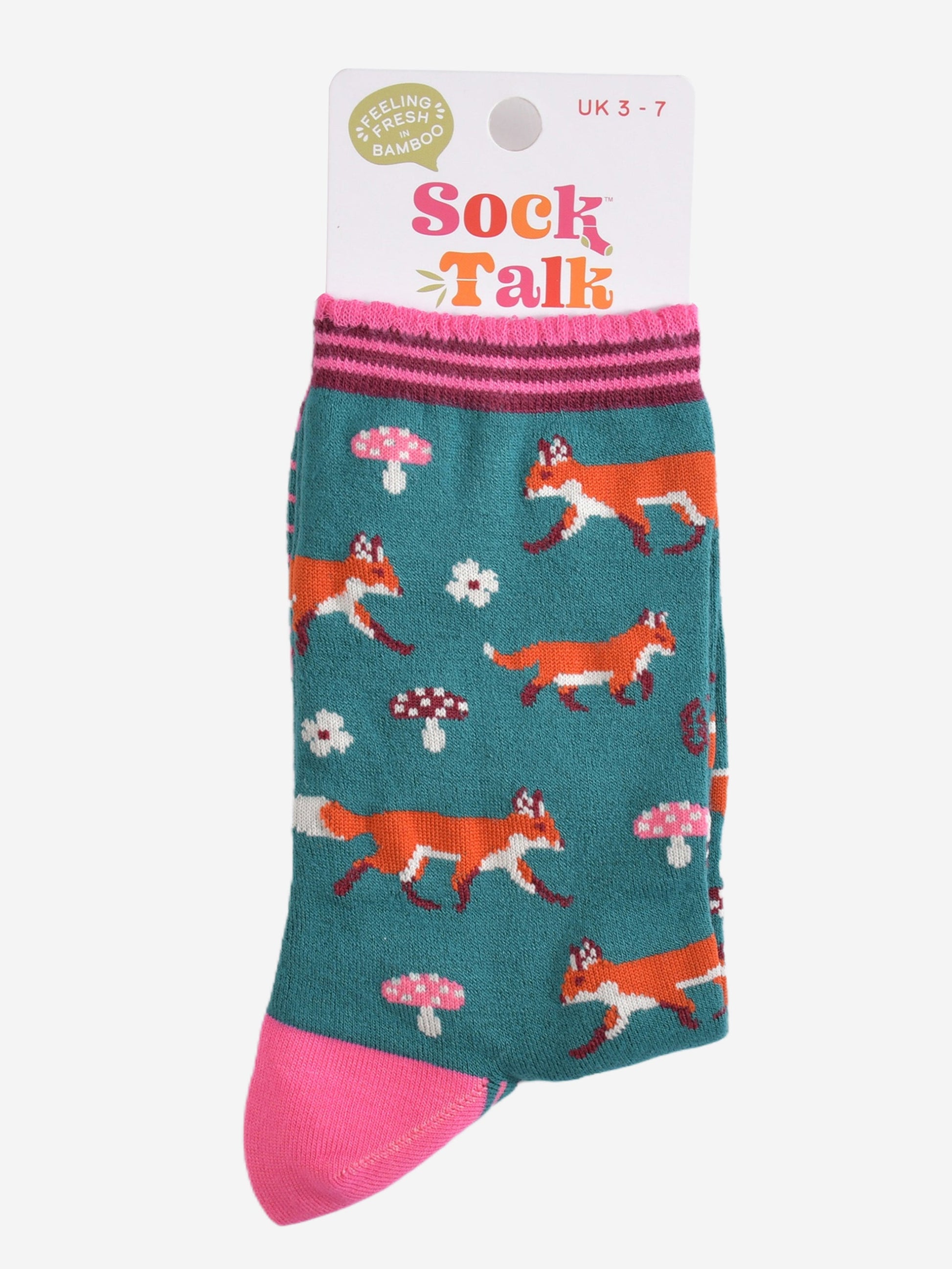 green and pink woodland fox bamboo socks in their sock talk packaging, the socks are a uk size 3-7