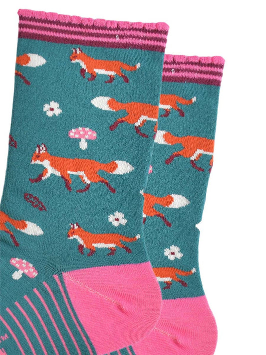 close up of the fox, toadstool and floral pattern on the socks