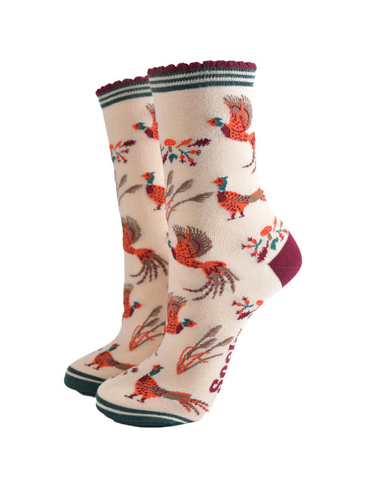 cream ankle socks with a pattern of woodland pheasants and autumnal foliage and toadstools