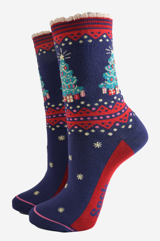 navy blue and red bamboo socks with a classic green xmas tree and presents on the ankle of the socks