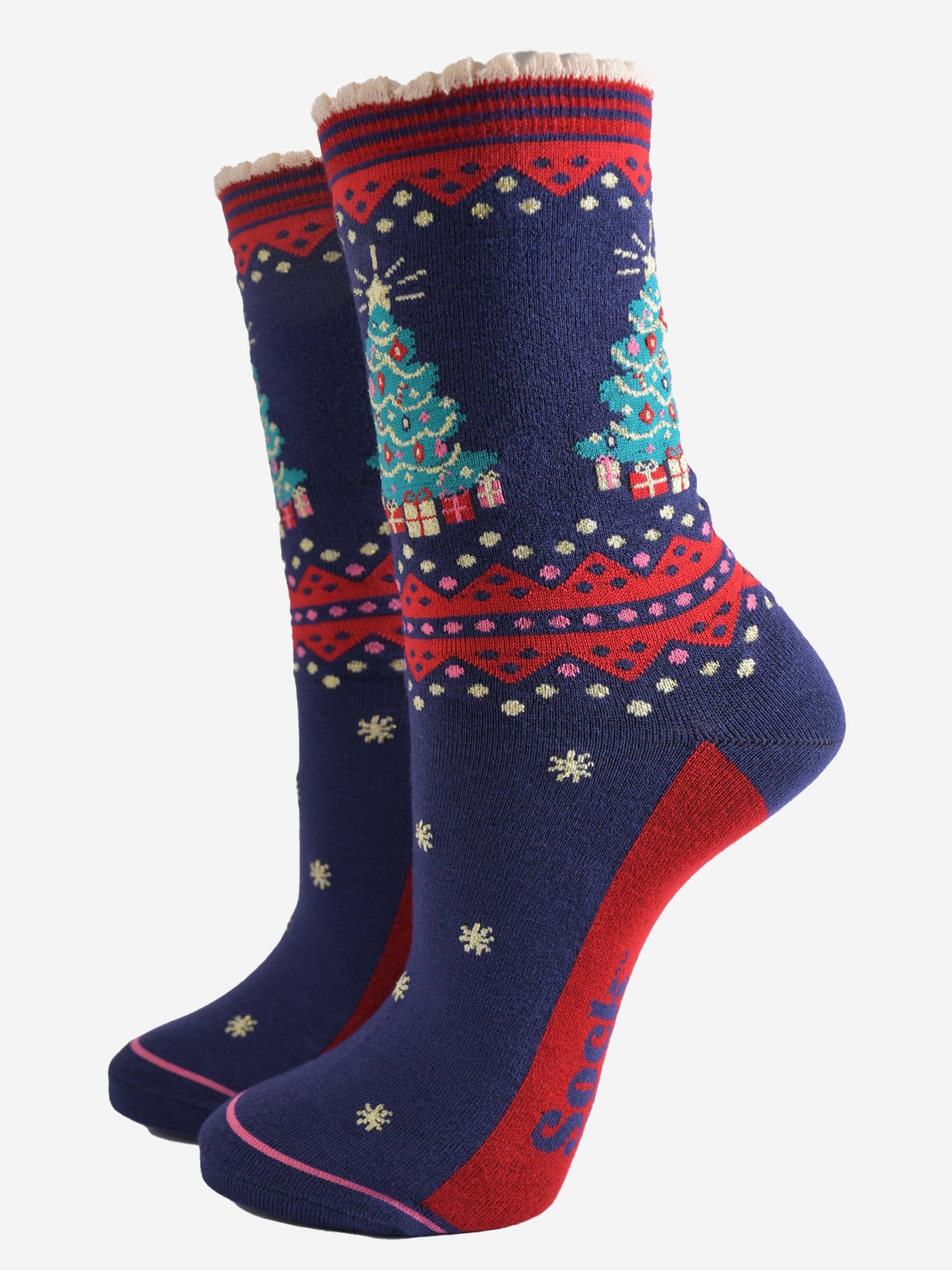 navy blue and red bamboo socks with a classic green xmas tree and presents on the ankle of the socks