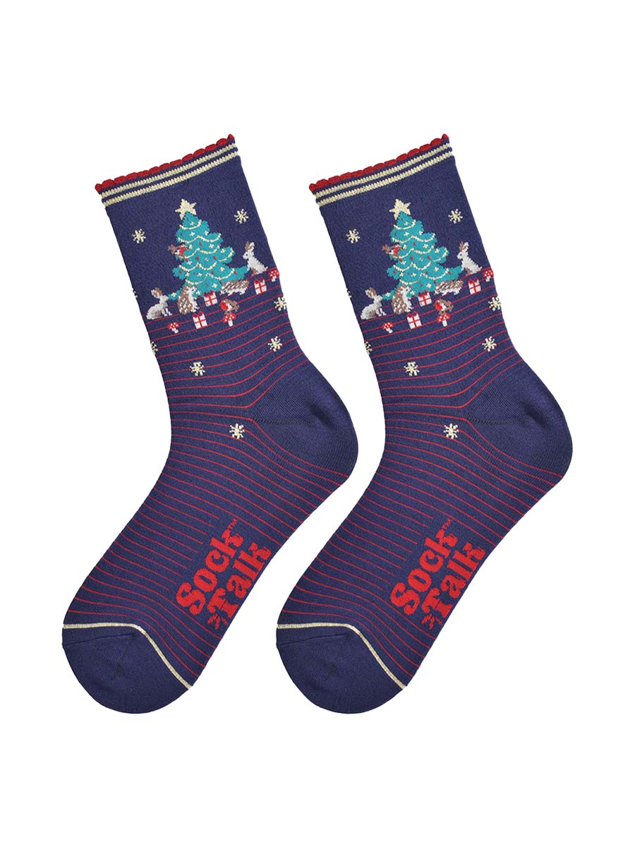 showing the woodland animal christmas socks laying flat, showing a red pinstripe pattern, gold stars and the christmas tree scene on the ankle