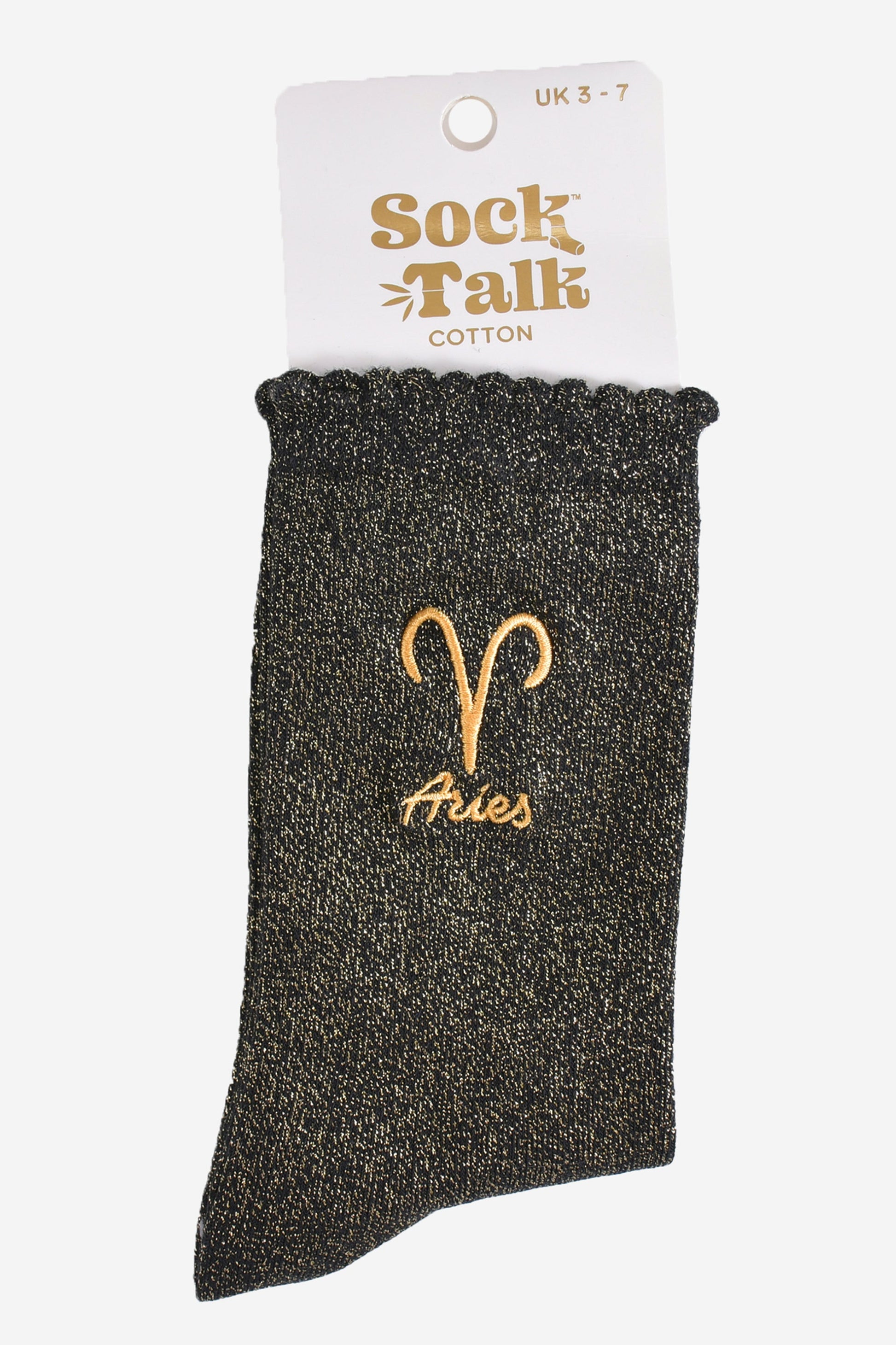 gold and black glitter aries socks in their sock talk packaging, these socks are a uk size 3-7