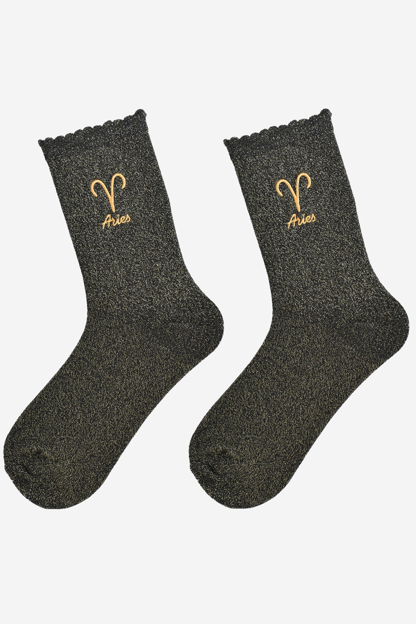 black and gold glitter embroidered aries socks laying flat, showing the all over gold glitter sparkle